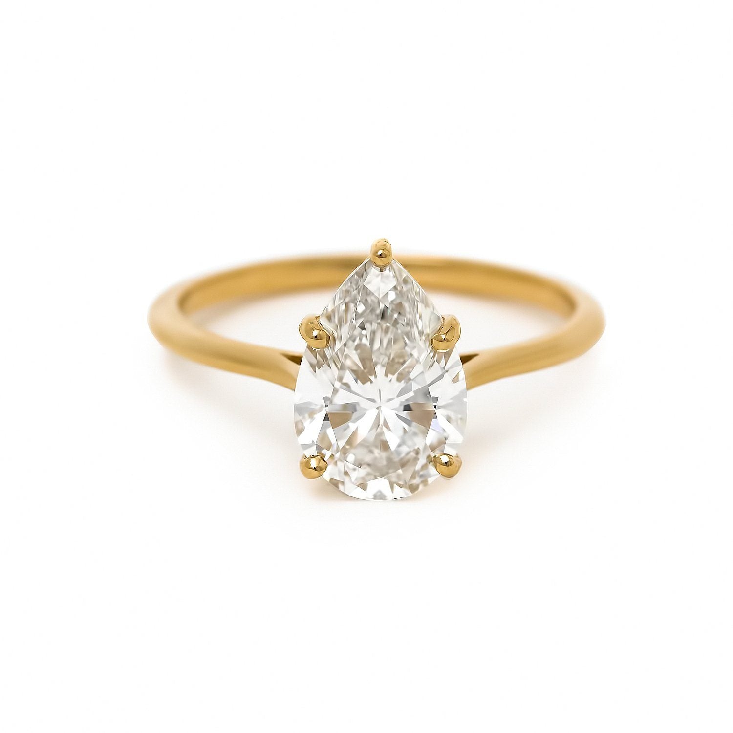 Delicate modern pear diamond ring