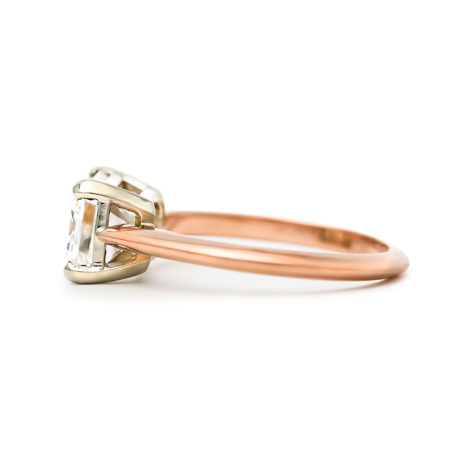 East west emerald cut diamond engagement ring in rose gold