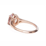 Claw prong oval diamond engagement ring Mahenge garnet